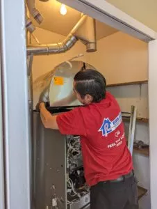 Robin Aire technician installing a new furnace