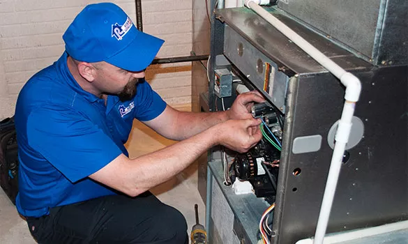 reliable technician repairing from robin aire service network Worry-Free Service Plan