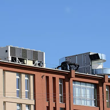 Commercial rooftop HVAC units from afar