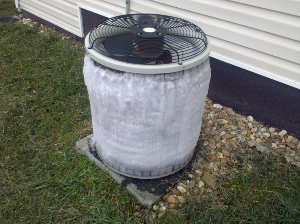 Frozen air conditioning unit outside a home in Michigan