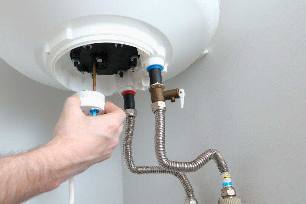 Plumber repairing a boiler