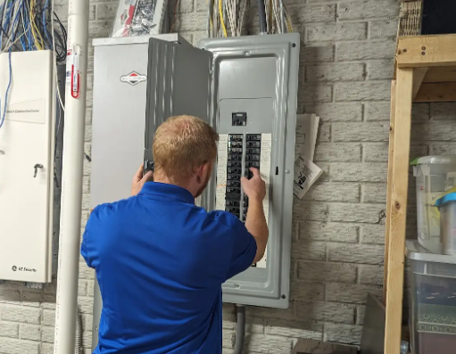 Electrician inspecting circuit breakers